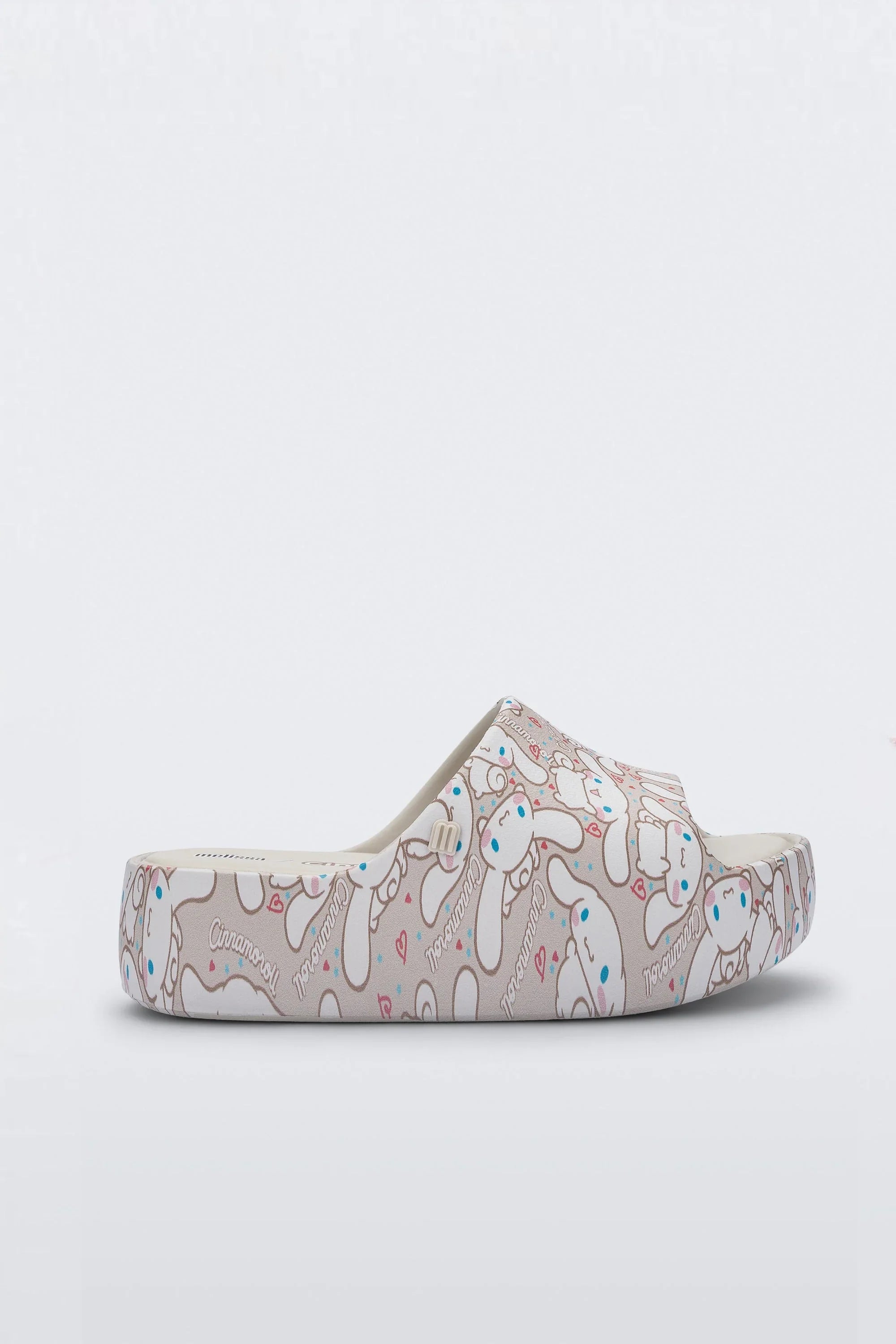 MELISSA FREE PLATFORM SLIDE + HELLO KITTY AND FRIENDS AD