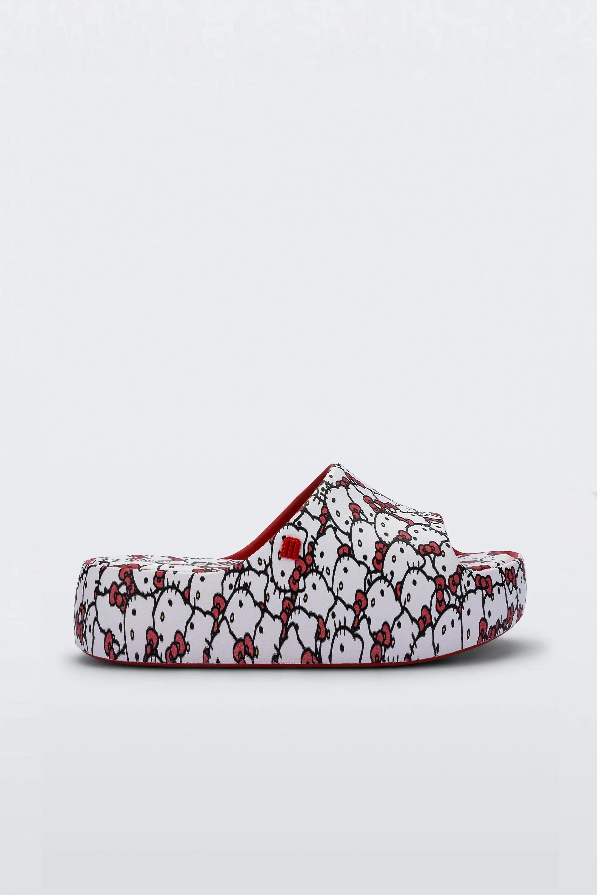 MELISSA FREE PLATFORM SLIDE + HELLO KITTY AND FRIENDS AD