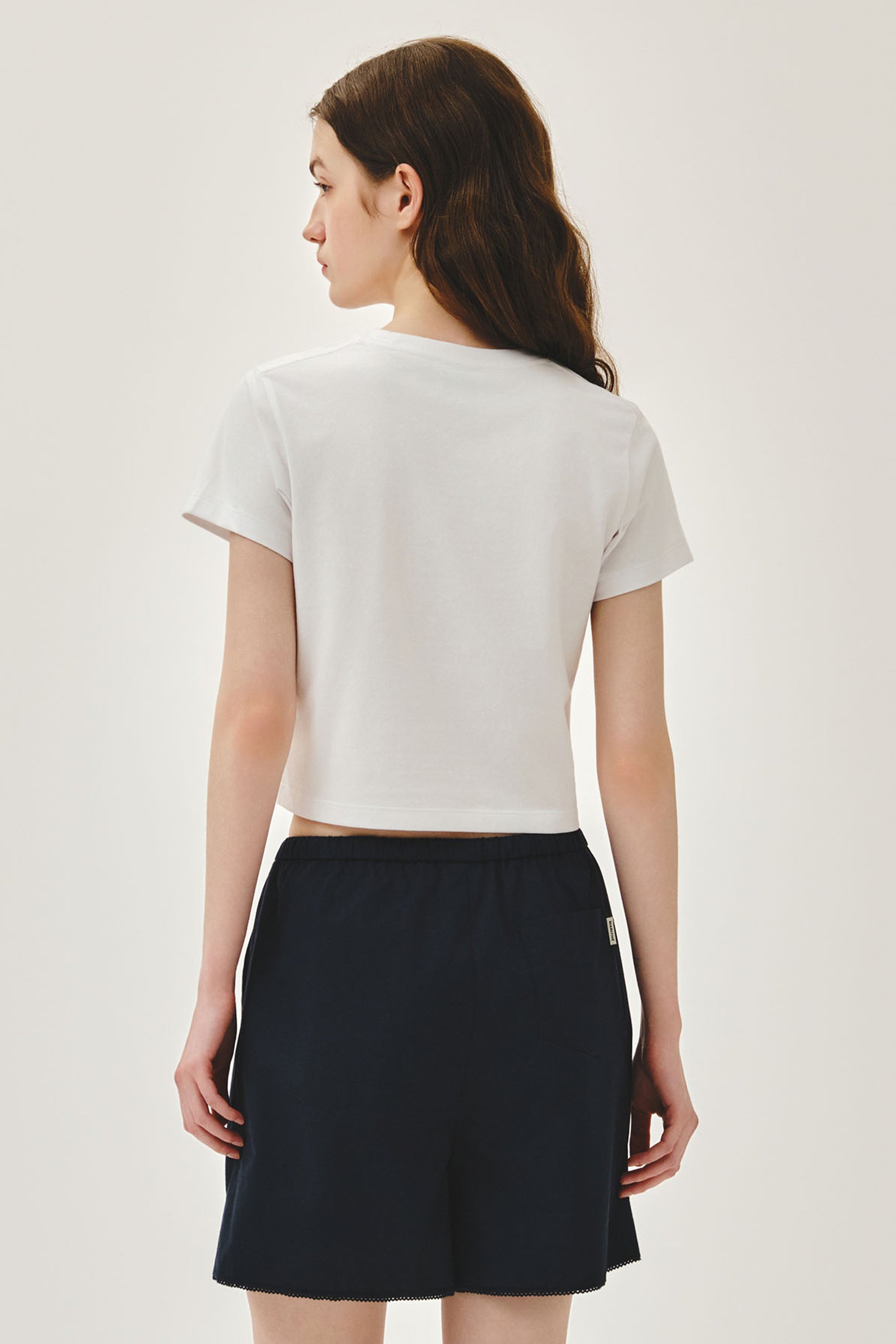 W Sorona Cool Ribbon Graphic Crop Tee White