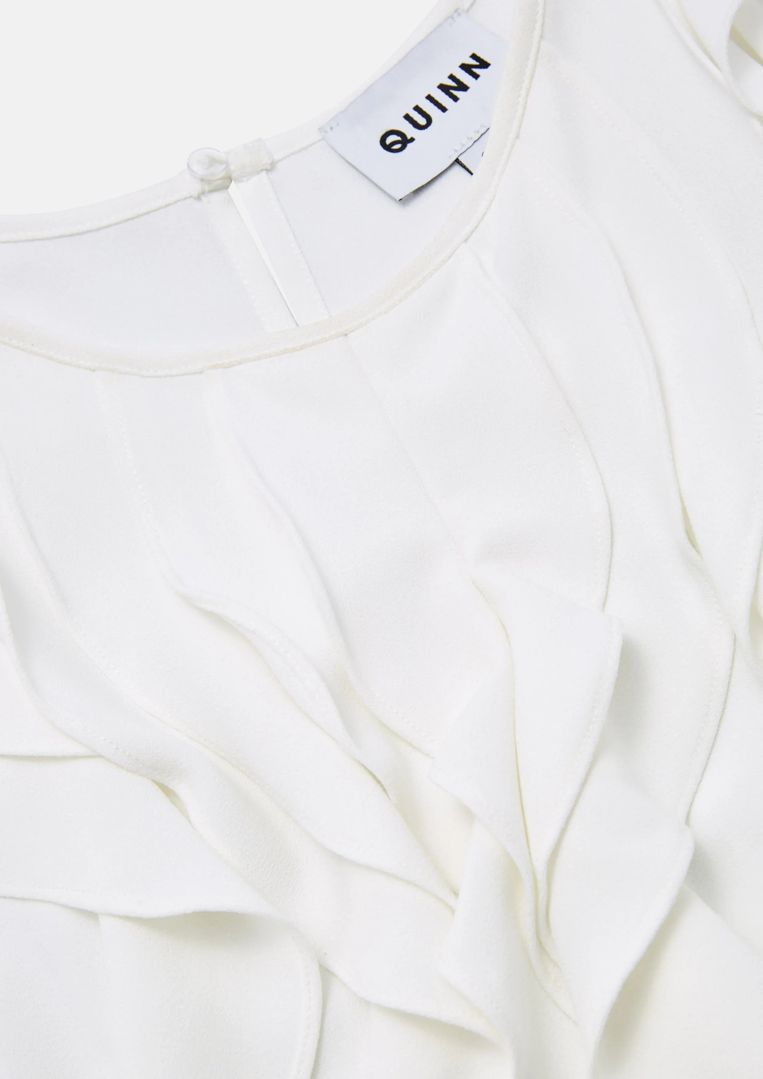 เสื้อครอปแขนกุดแต่งระบาย