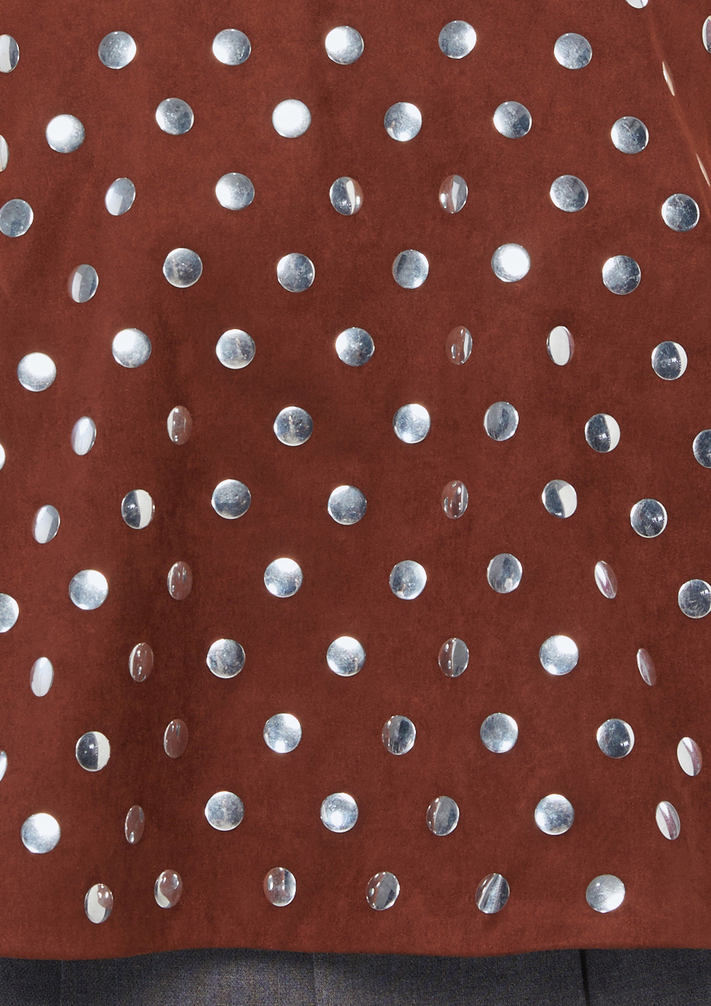 เสื้อหนังกลับแต่งหมุดโลหะ