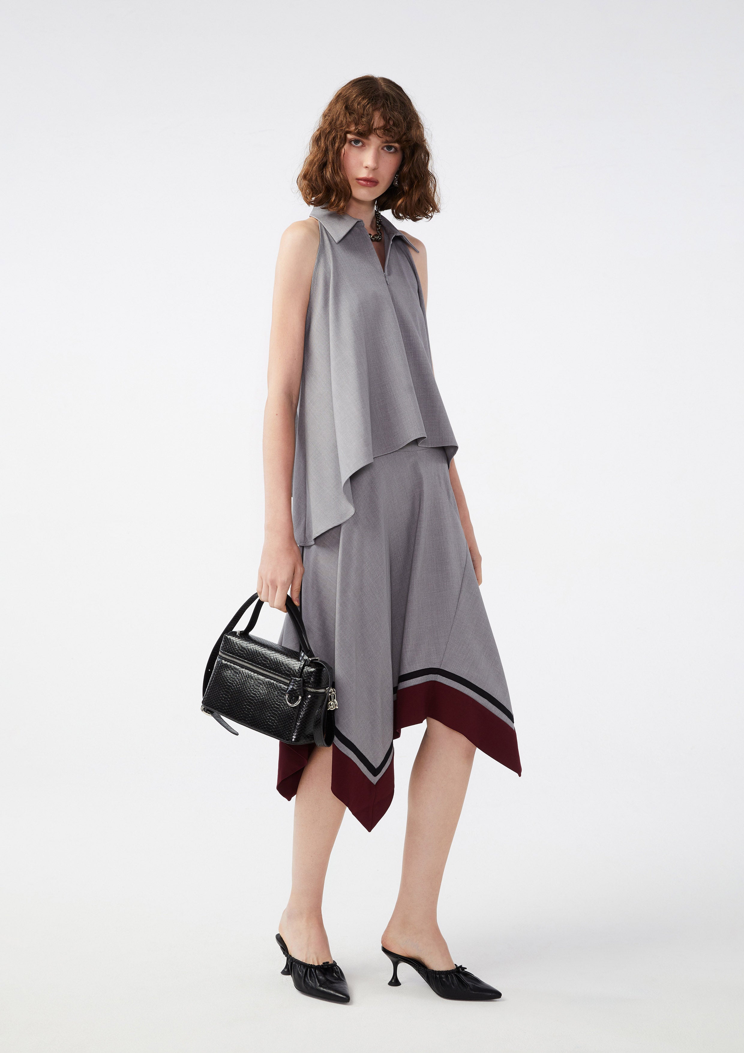 กระโปรงคลุมเข่าชายกระโปรงอสมมาตร