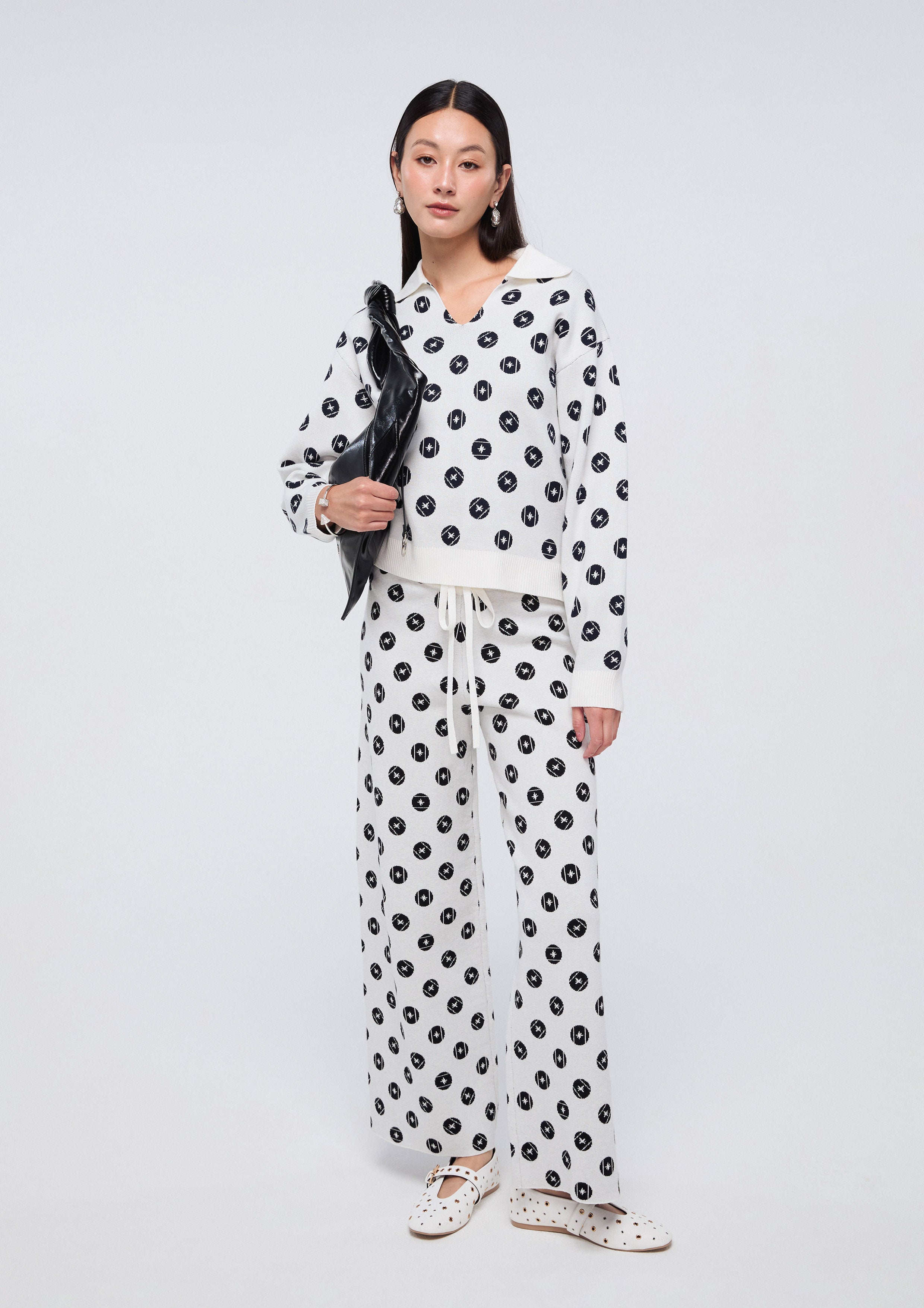 กางเกงขายาวผ้านิตลายกราฟฟิค