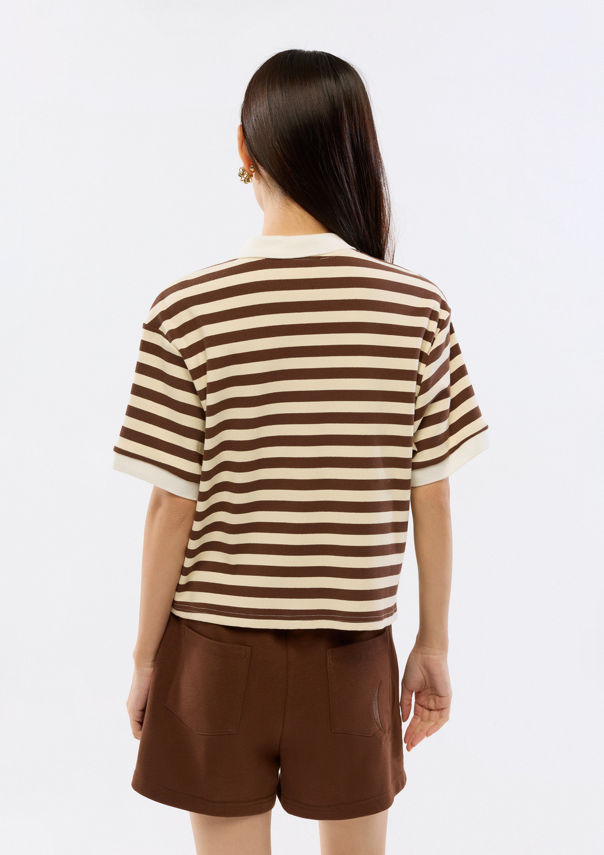 เสื้อโปโลผ้านิตลายทางปักโลโก้