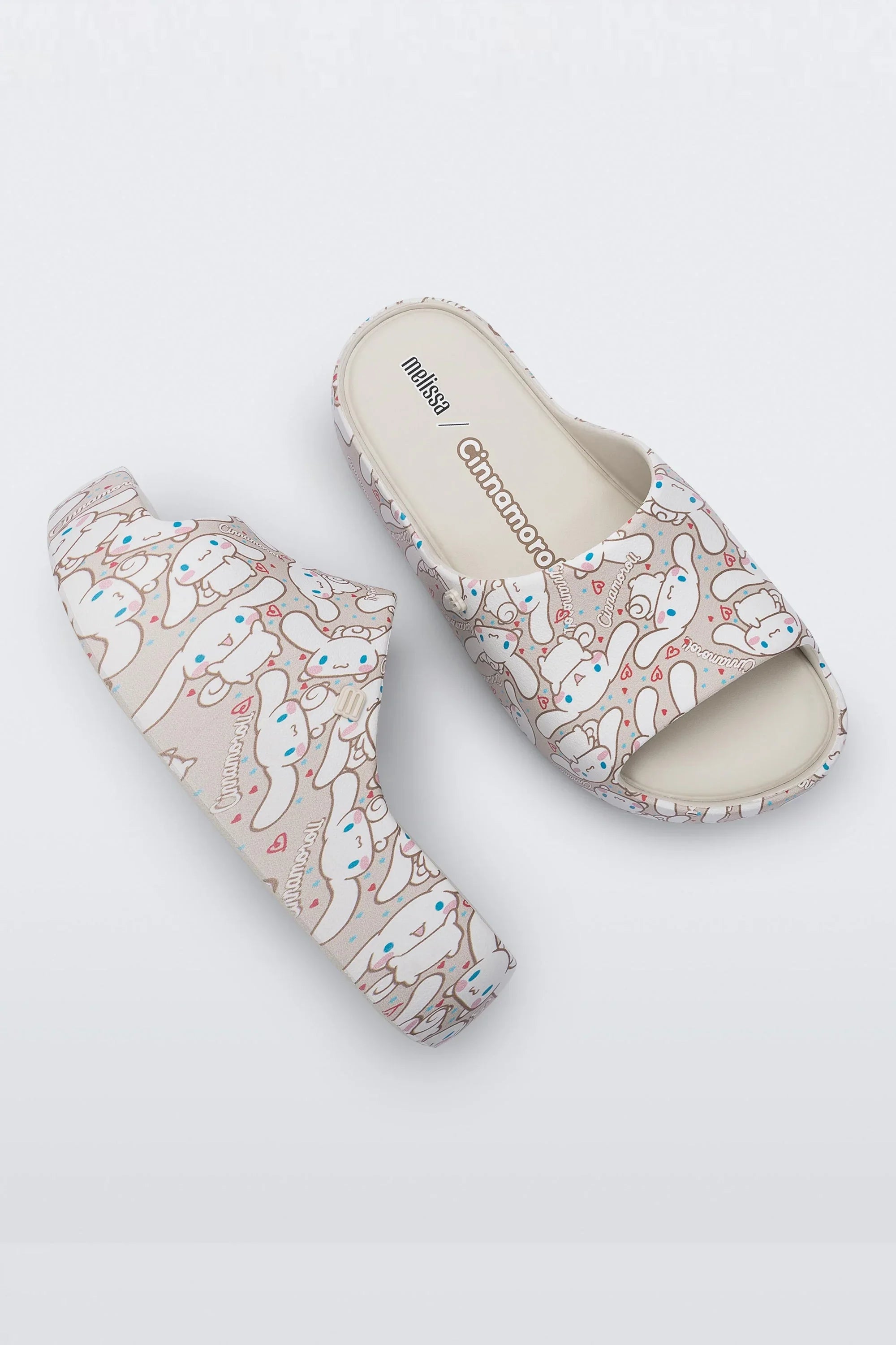 MELISSA FREE PLATFORM SLIDE + HELLO KITTY AND FRIENDS AD