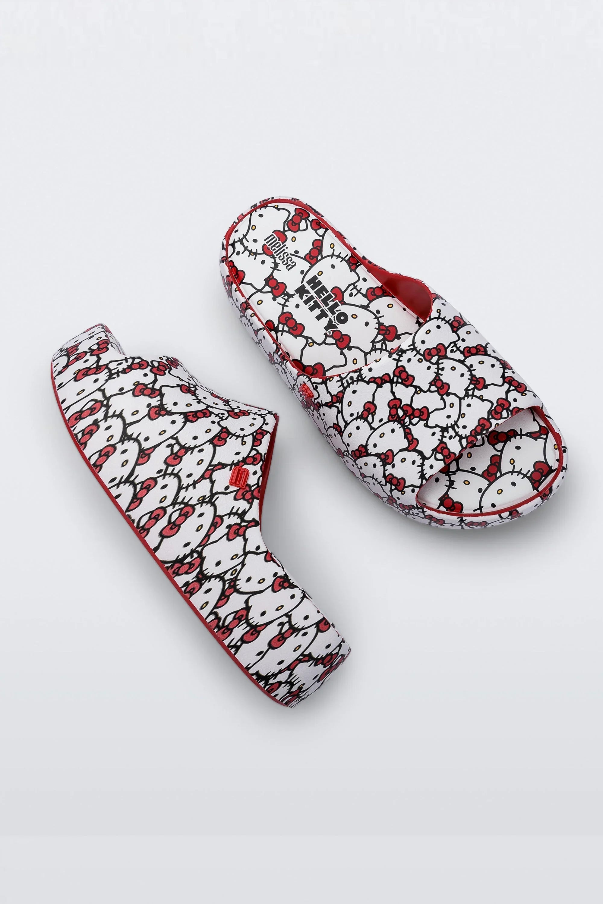 MELISSA FREE PLATFORM SLIDE + HELLO KITTY AND FRIENDS AD
