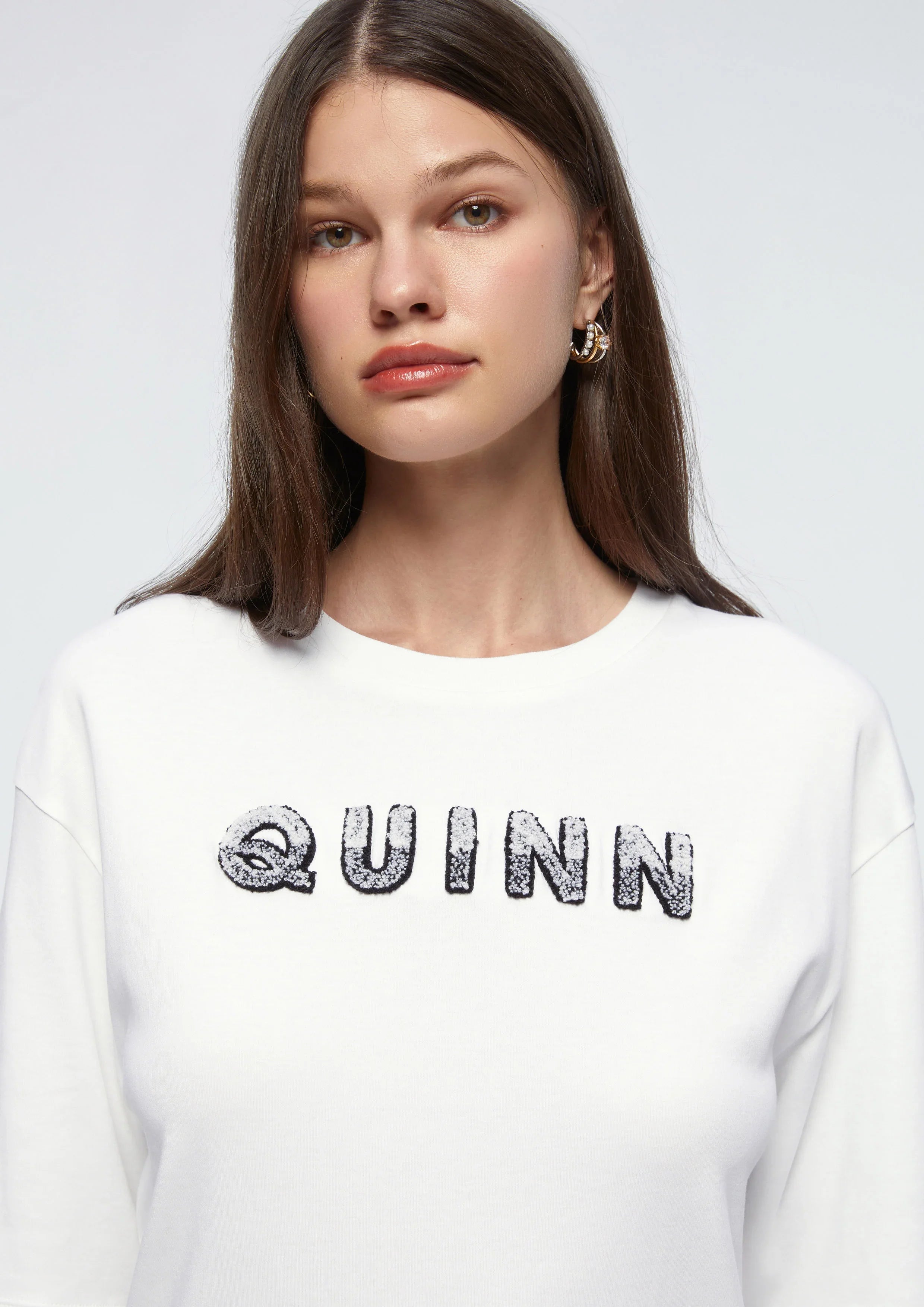 เสื้อยืดโอเวอร์ไซส์ปักโลโก้