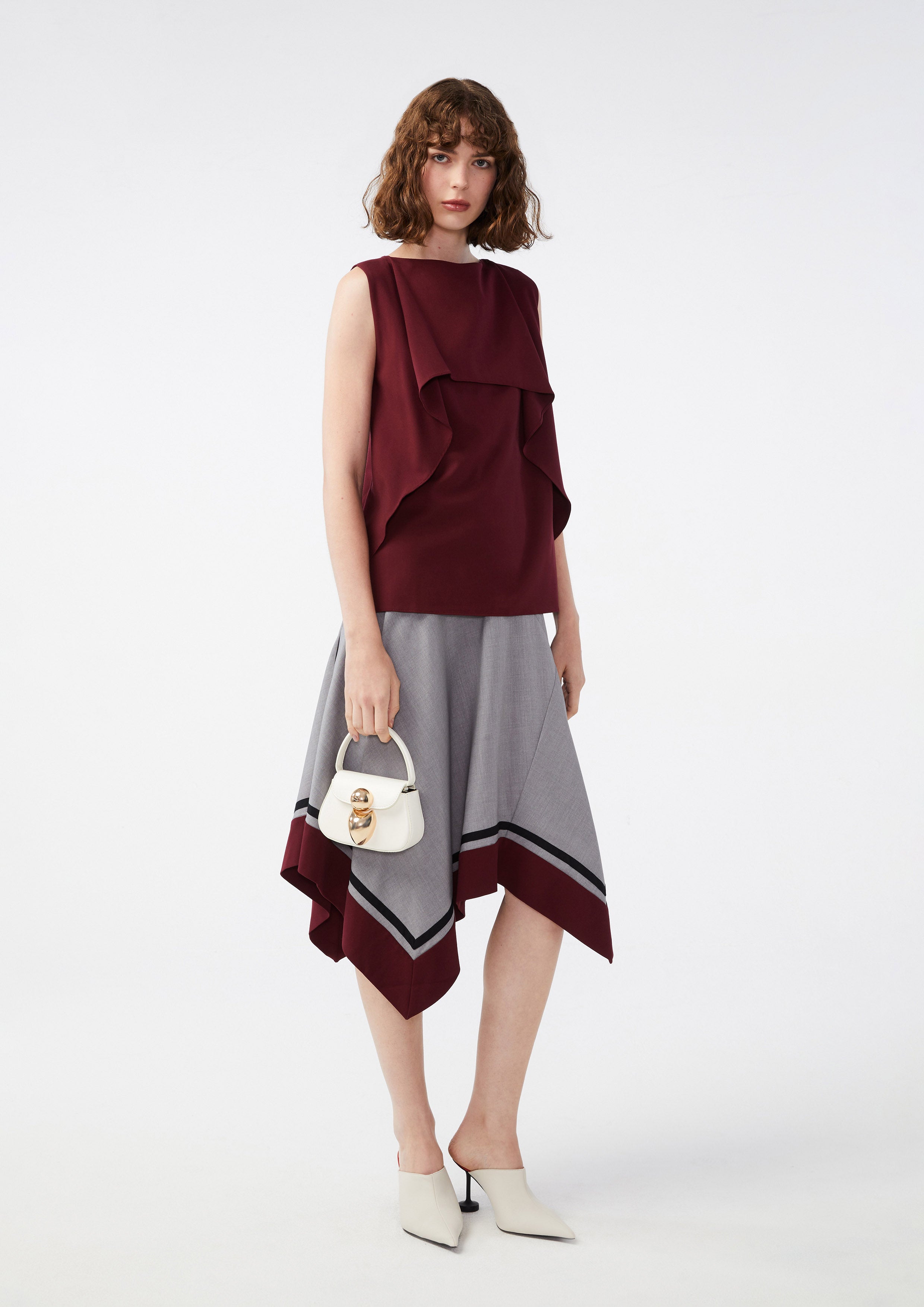 เสื้อแขนกุดเลเยอร์ระบายรัฟเฟิล