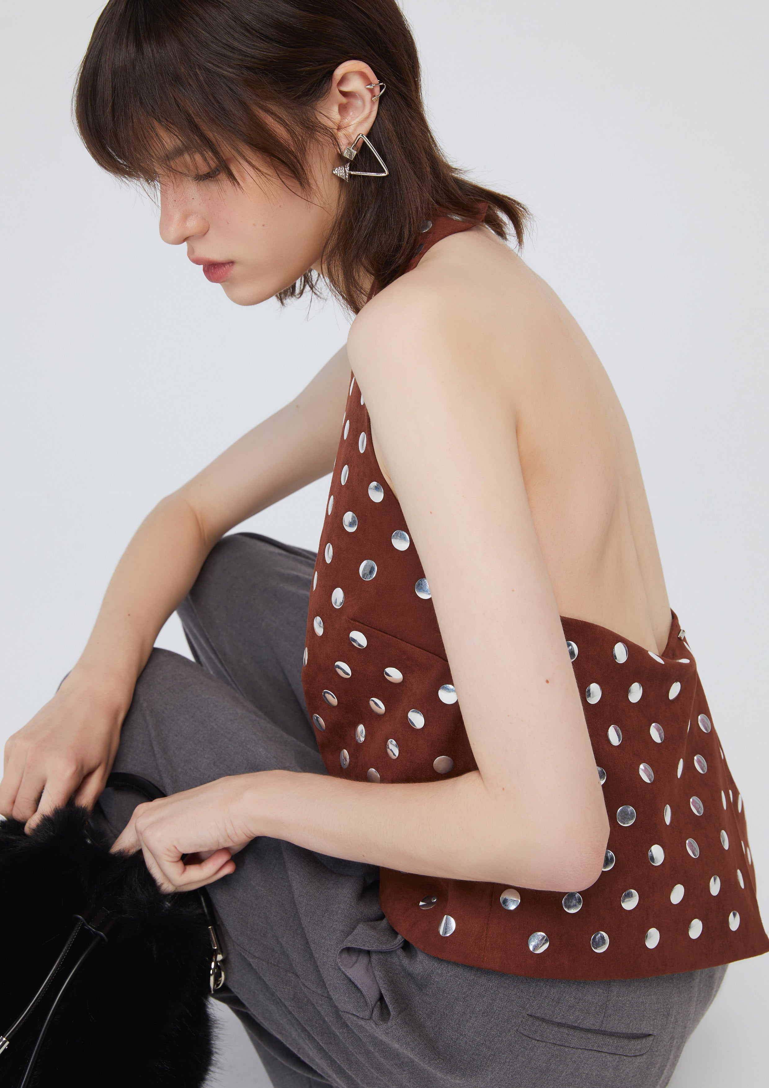 เสื้อหนังกลับแต่งหมุดโลหะ