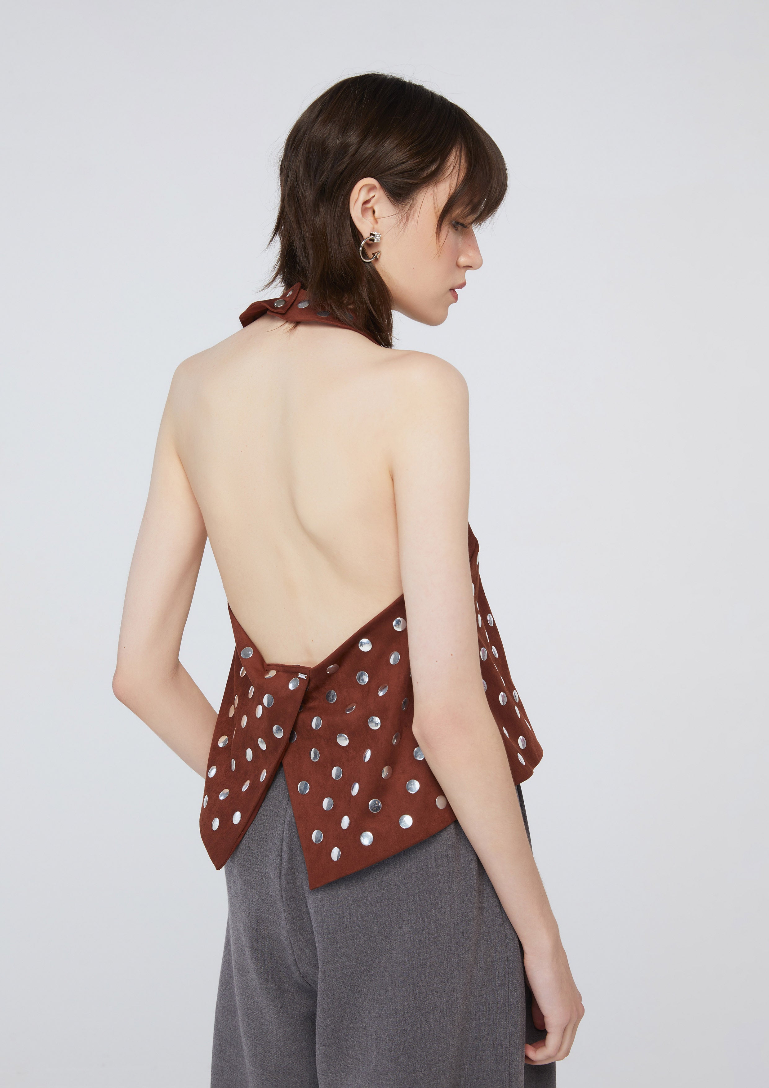 เสื้อหนังกลับแต่งหมุดโลหะ