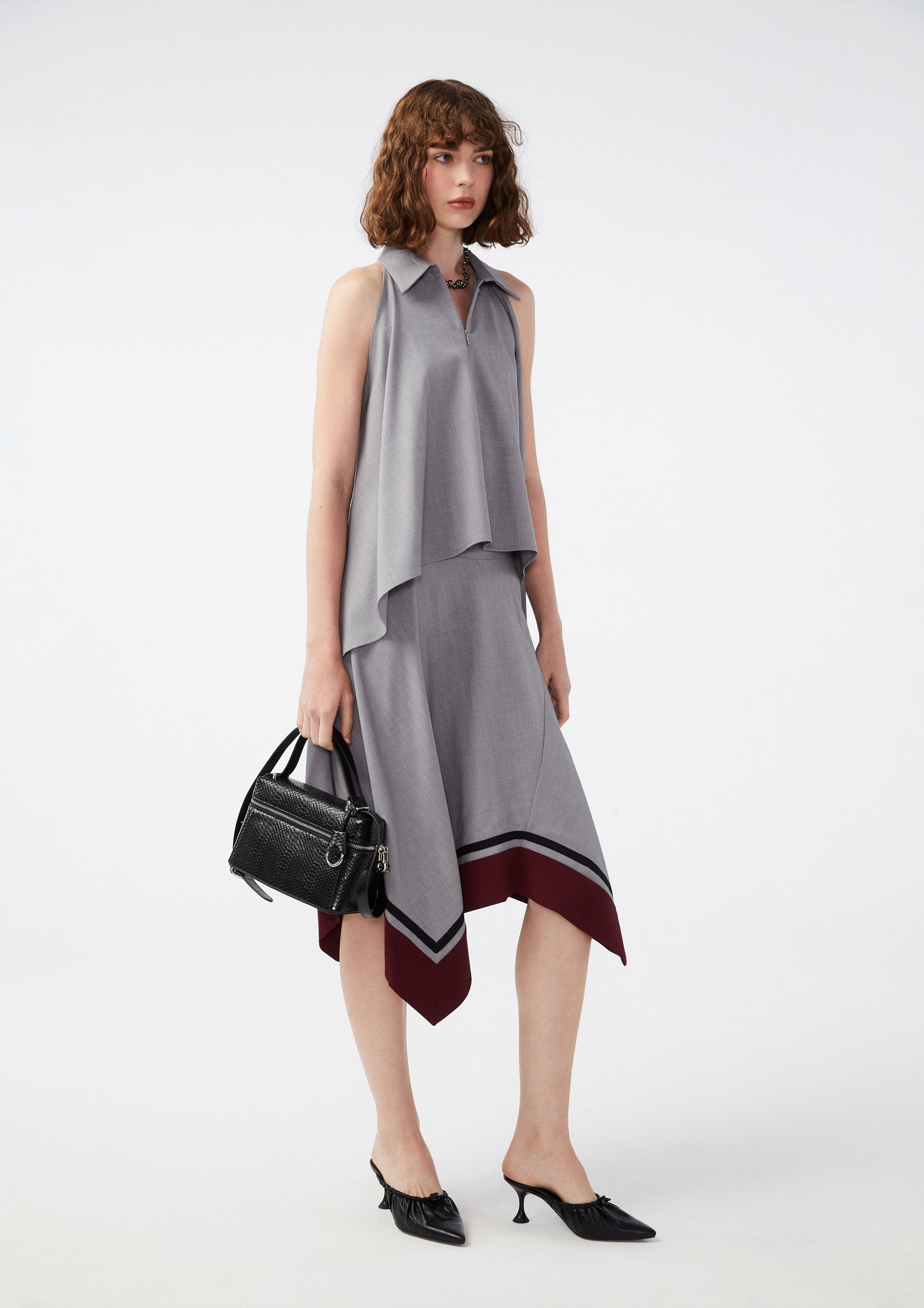 เสื้อแขนกุดชายเสื้อระบาย