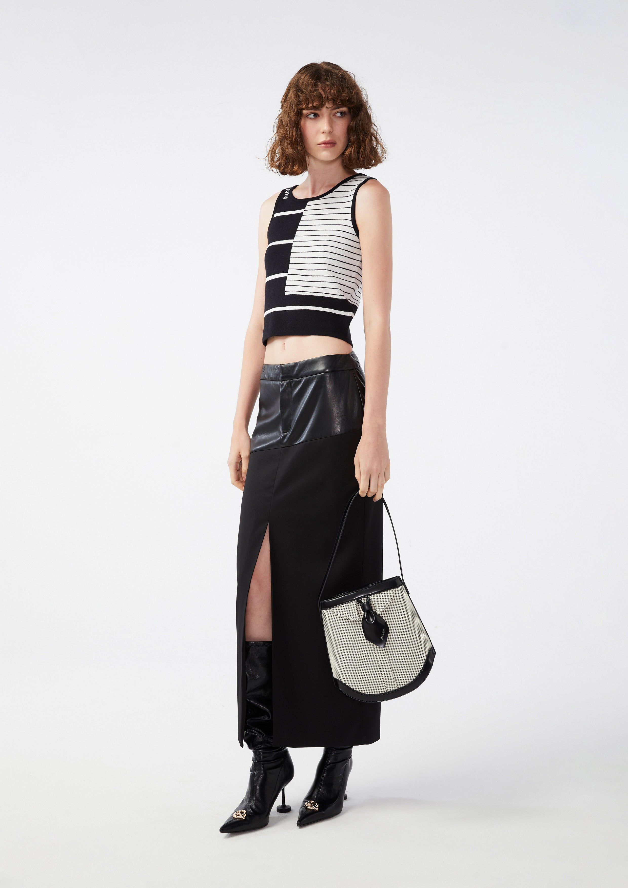 กระโปรงคลุมเข่าแต่งพาแนลผ้าหนัง